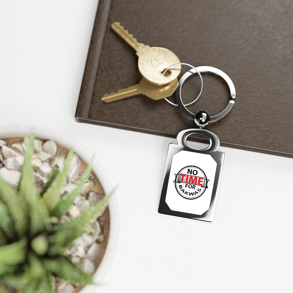 Rectangle photo keyring with "No Time for Bakwas" design on a silver swivel zinc alloy frame attached to keys on a brown surface