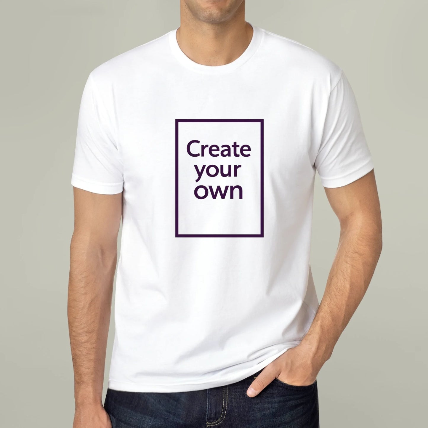 Person wearing a white t-shirt with 'Create your own' text on a plain background